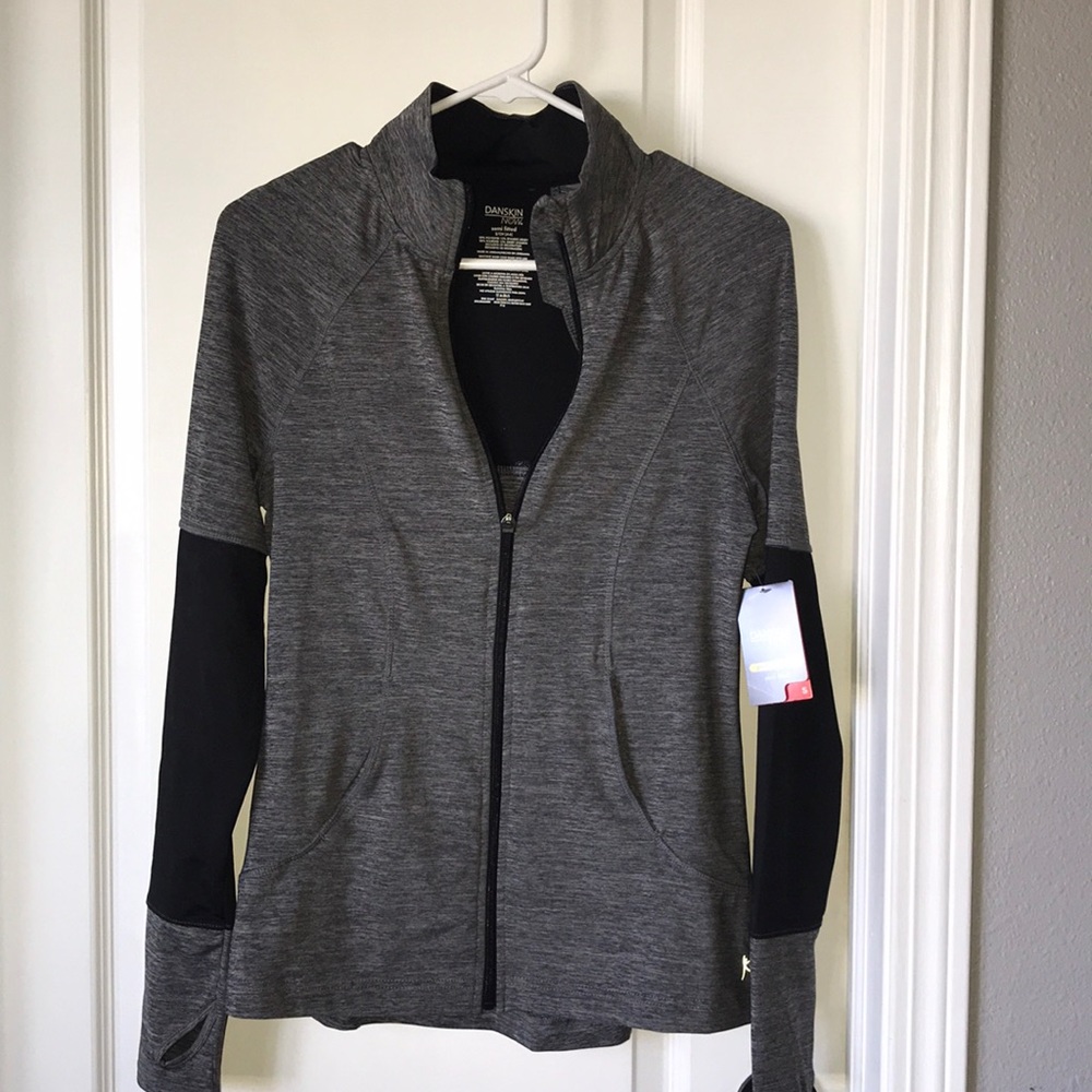 NWT zip up jacket.